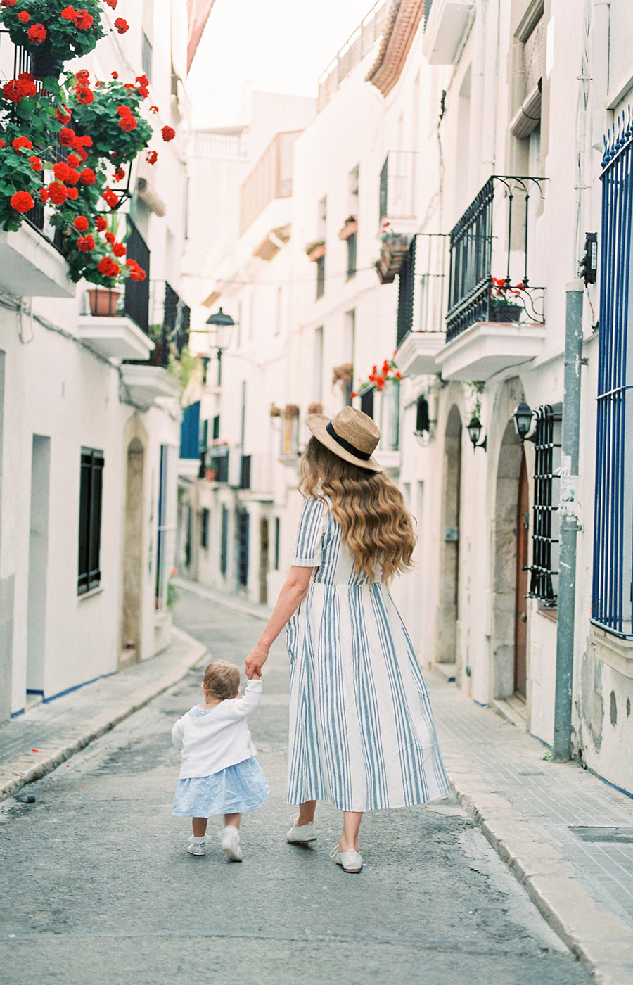 Sitges Family Photographer | Lovely young mother with her little dauther | Lena Karelova Photographer in Barcelona