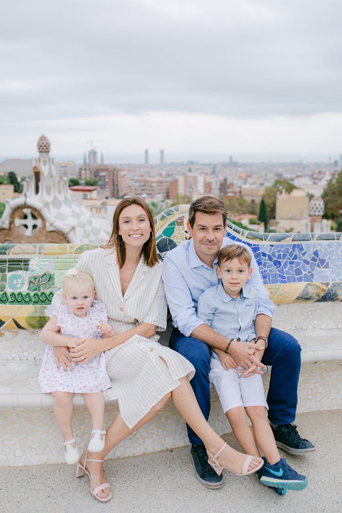 Parents with kids formal portrait in Park Guell Barcelona Family Photographer