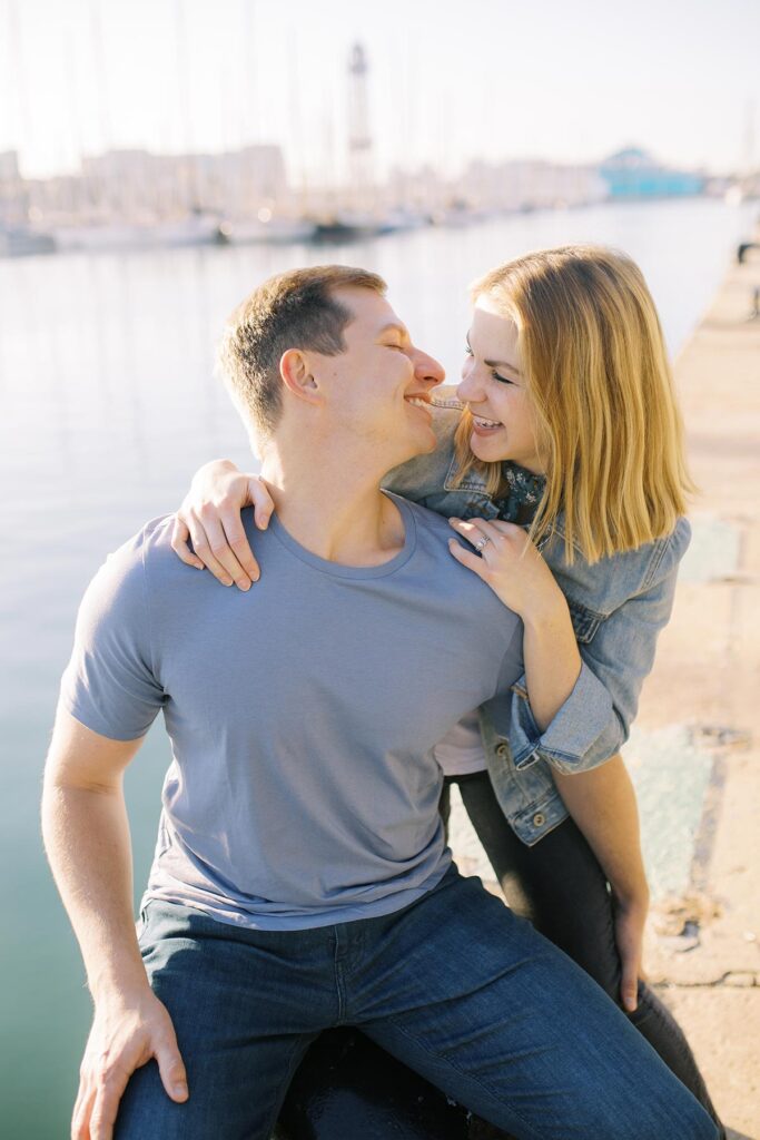 Young laughing couple during the honeymoon photoshoot in Barcelona's Gothic Quarter