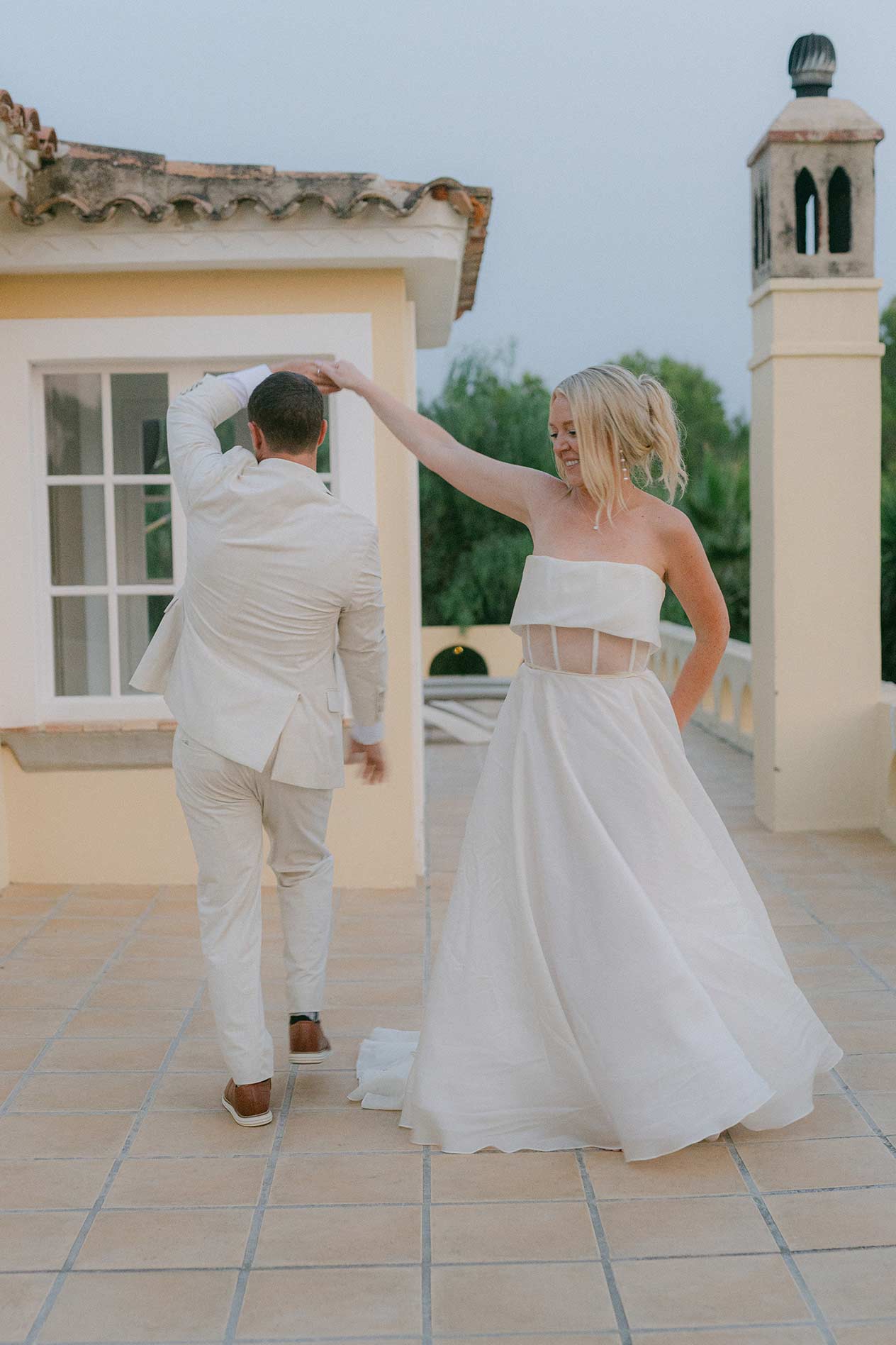 Bride and groom first dance at Mediterranean villa wedding near Barcelona. Wedding in Spain by Lena Karelova Photography
