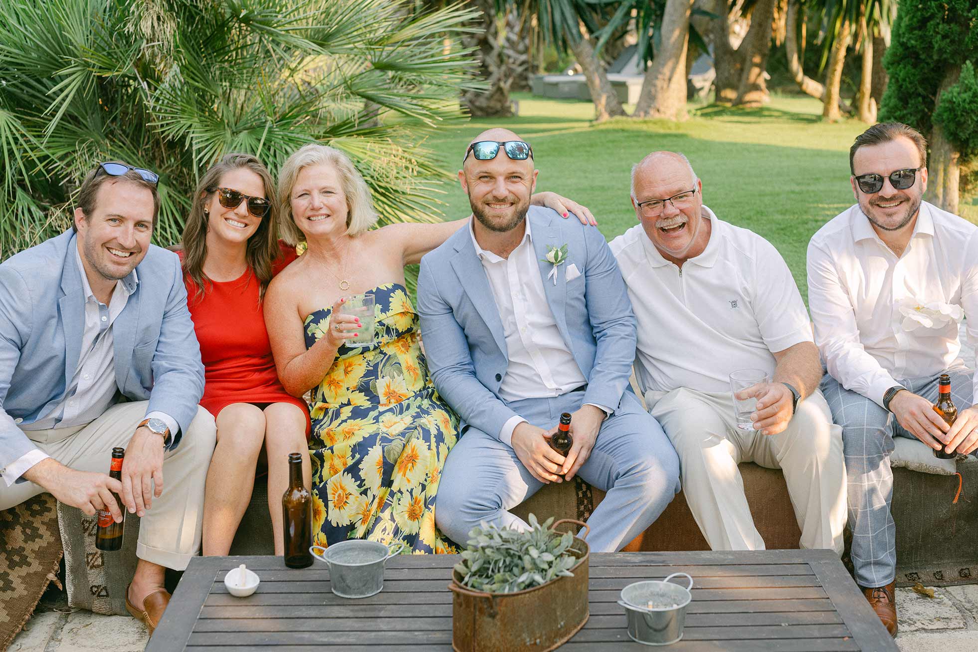 Group of guests having fun during the aperetif and cocktail hour at Mediterranean Villa Wedding near Barcelona, Spain