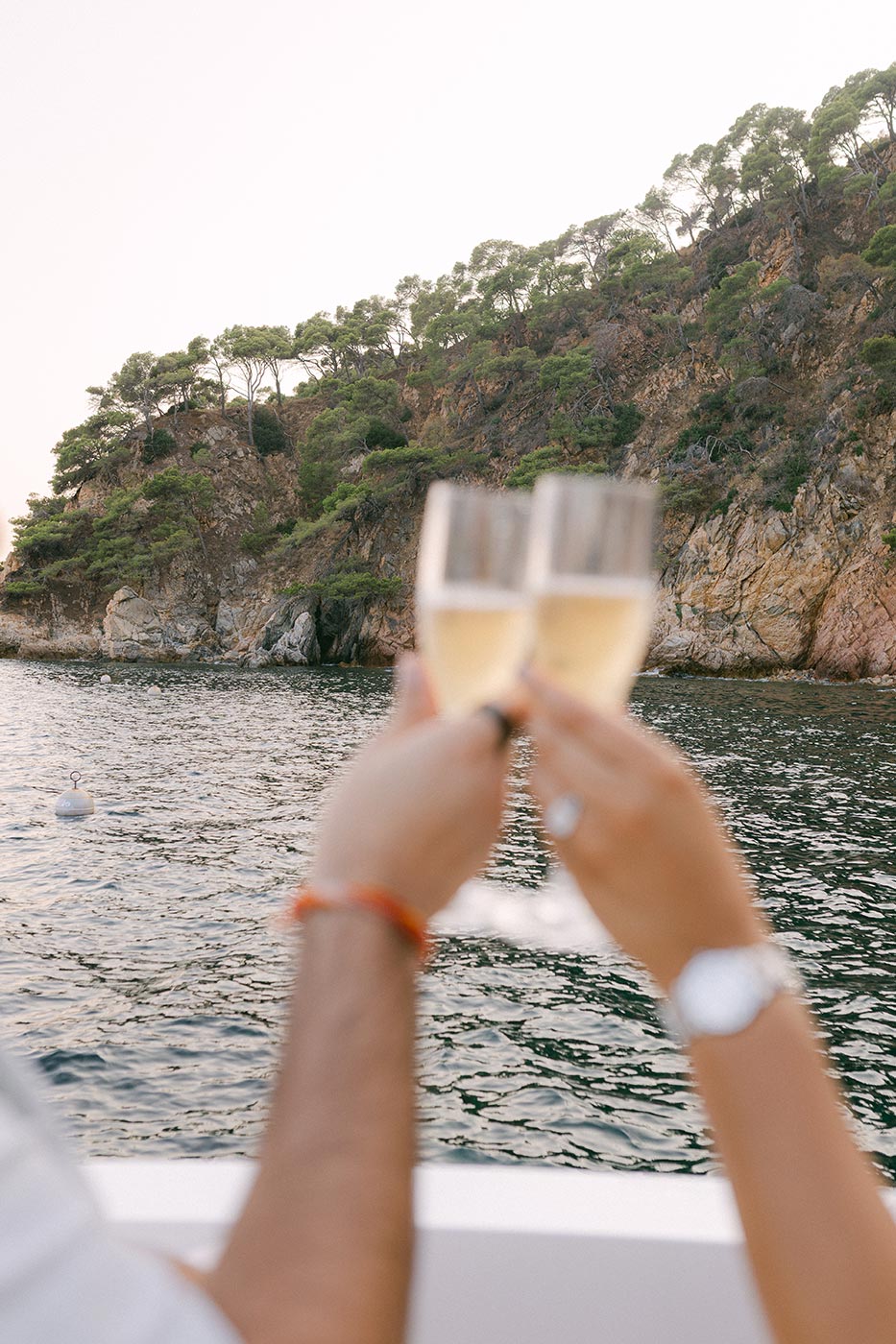 Couple Celebrating new chapter, surprise proposal on the Costa Brava. Best locations for proposal on COsta Brava, Spain