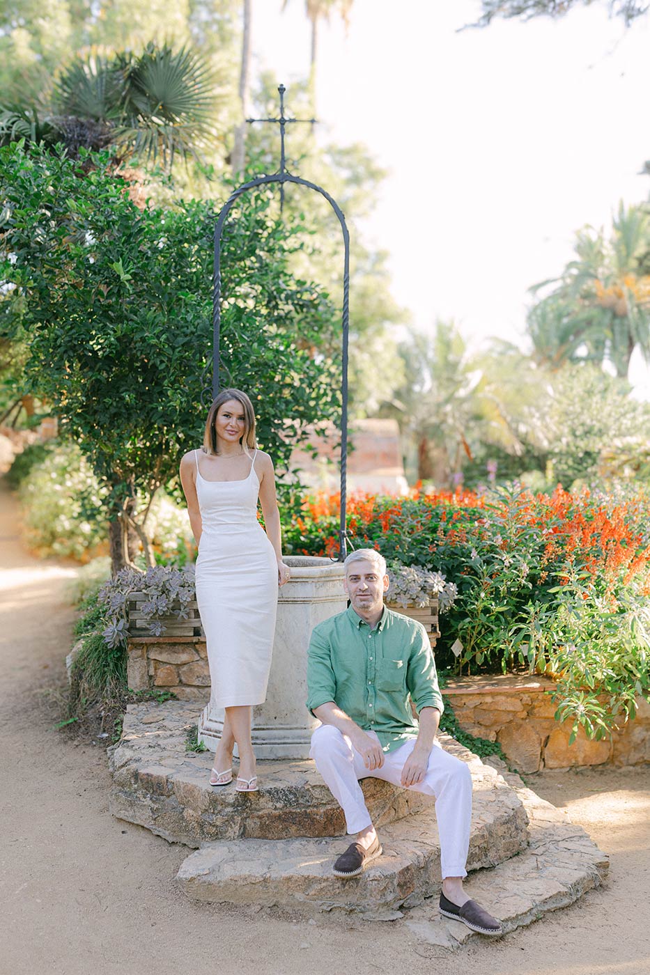 Elegant couple posing in vougue style after surprise proposal in Costa Brava, at the Marimurtra Botanica Garden